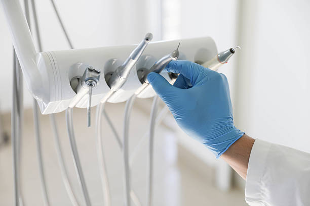 Professional Invisalign Clear Aligners technician working in College Station, TX